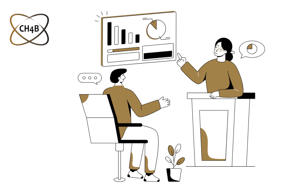Two people discussing data on a presentation screen.
